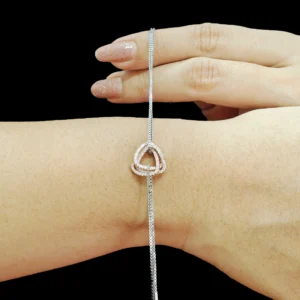 Triangle Trio Dual Tone Bracelet in sterling silver with interlocked triangle charms and dual-layered chain