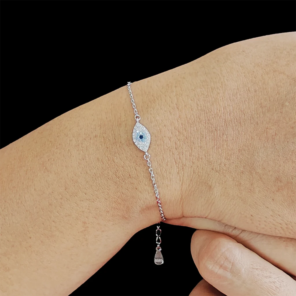 Minimal evil eye bracelet with zircon-studded centerpiece and chain on both sides