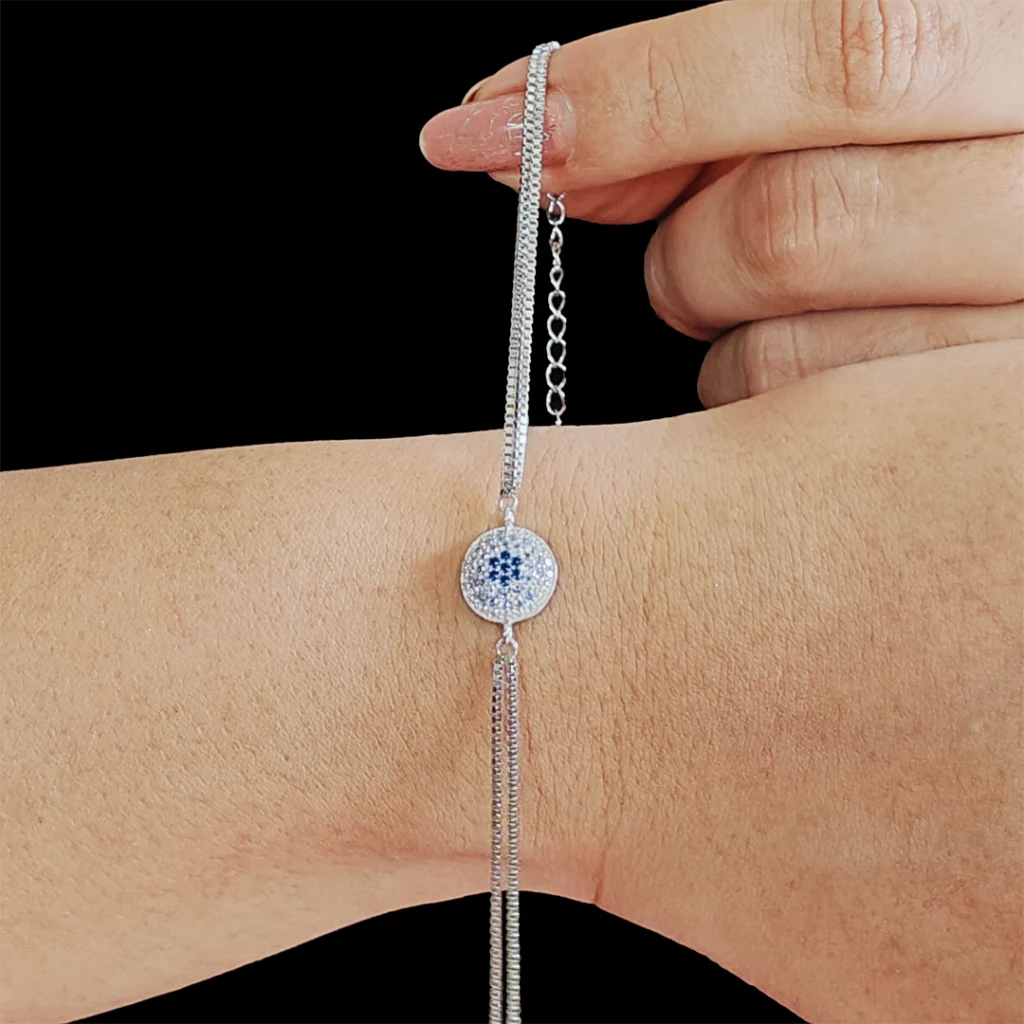 Dual layered silver evil eye bracelet with zircon-studded charm