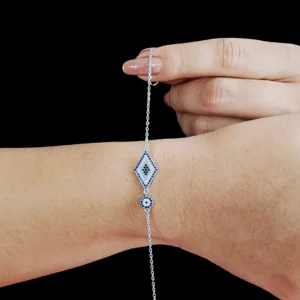 Silver evil eye nazariya bracelet with diamond-shaped and circular evil eye designs