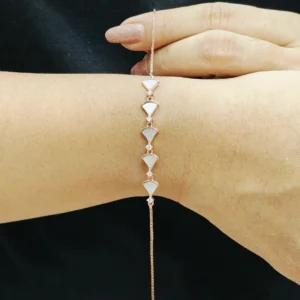Rose gold bracelet with traditional hand fan design and mother of pearl inlay