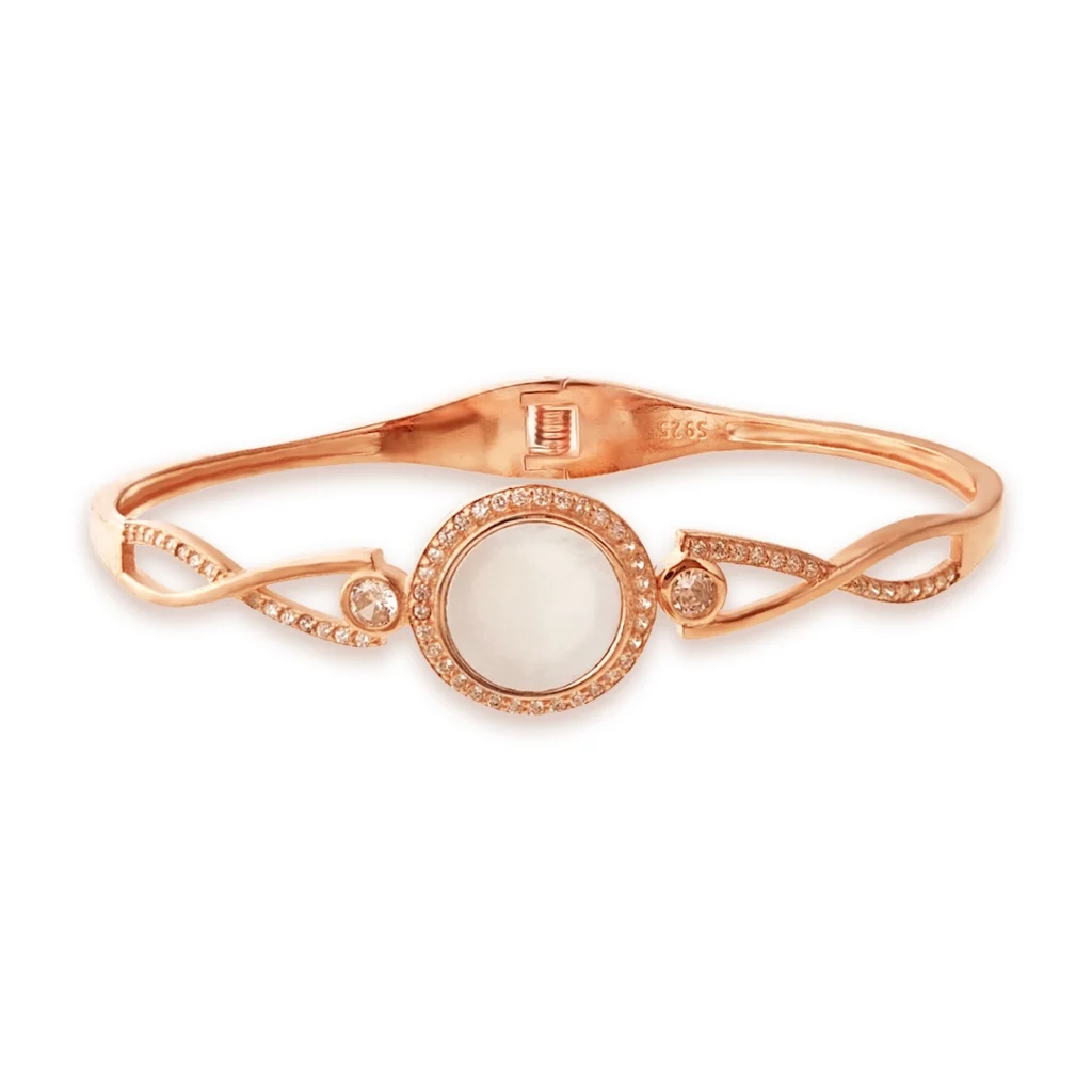 Cuff bracelet with moon-shaped pearl and zircons