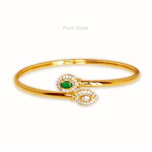 Gold finish twister bangle with green and white stones and zircon detailing in spiral design