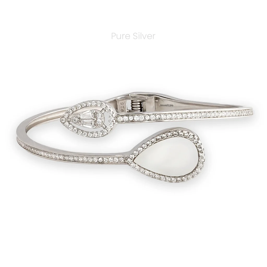 Twister bangle with pearl and zircon stones on each end