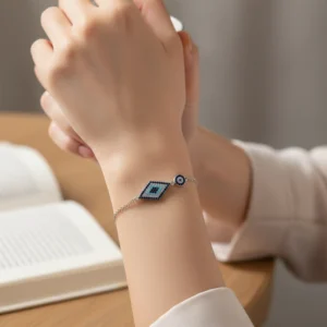 Silver evil eye nazariya bracelet with diamond-shaped and circular evil eye designs
