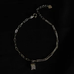 alt - Dual layered chain bracelet with square, rectangular, and triangular crystal
