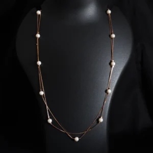 Dual layer pearl necklace in rose gold sterling silver with pearls throughout the chain