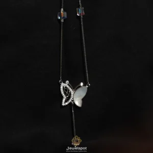 Butterfly necklace in sterling silver with mother of pearl, zircon wing, and cube crystal accents