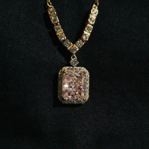 Rectangular pink rose quartz pendant with zircon border and bold stones on rose gold chain