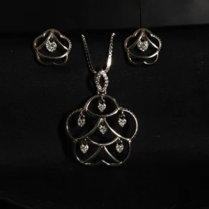 Abstract pendant and earring set in sterling silver with zircon accents