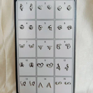 Assorted minimal sterling silver studs and drop earrings for daily wear