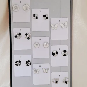 Assorted minimal sterling silver studs and drop earrings for daily wear