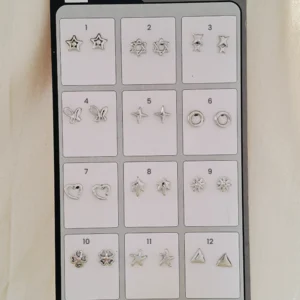 Assorted minimal sterling silver studs and drop earrings for daily wear