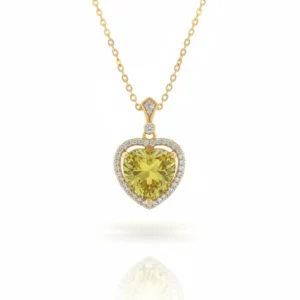 Lime heart pendant with green stone and zircons in gold finish on sterling silver chain.