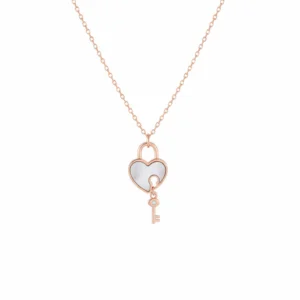 Rose gold sterling silver heart pendant with mother of pearl and key charm